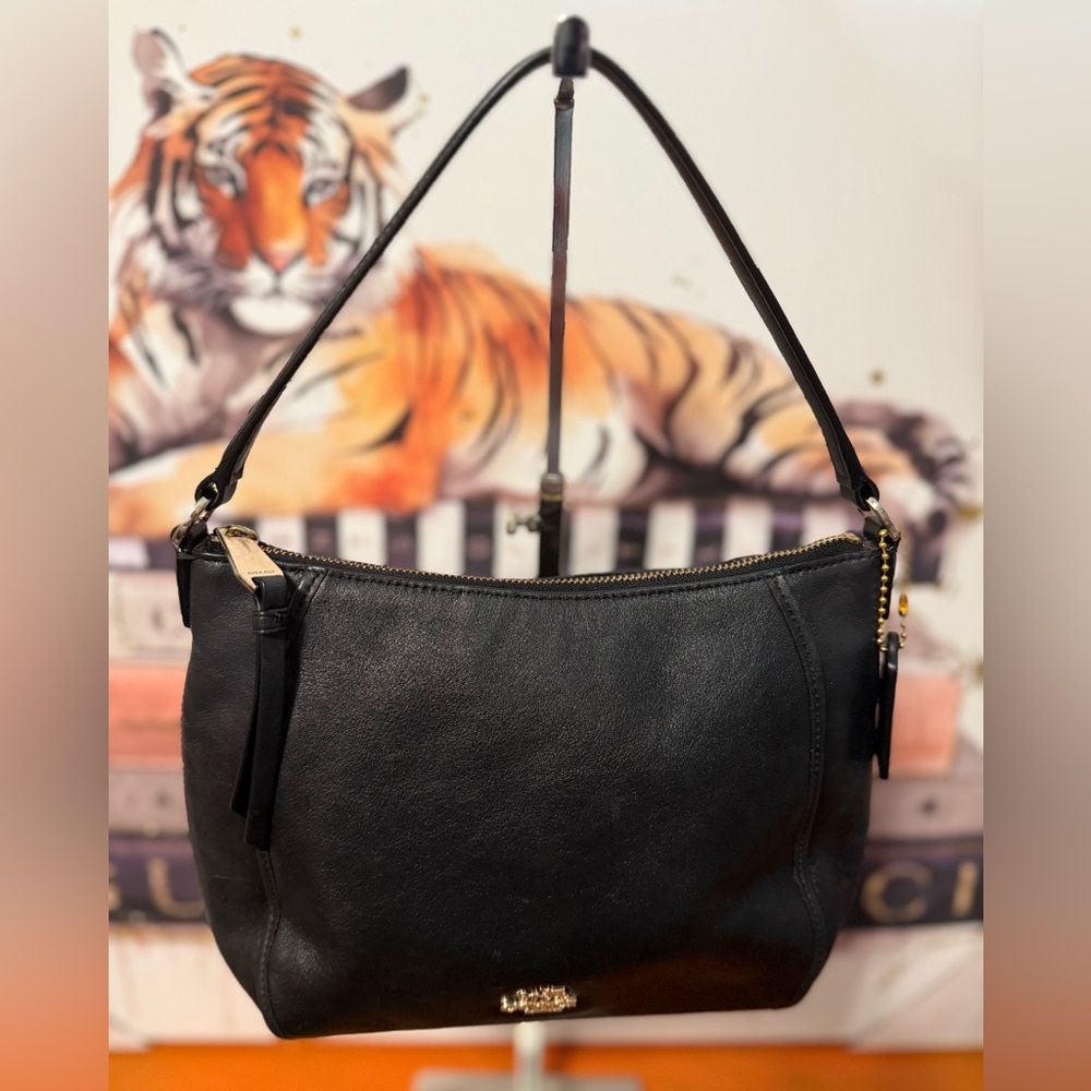 Coach Black Leather Shoulder Bag with Gold Accents.
